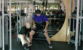 Mike performing lateral lunge for strengthing